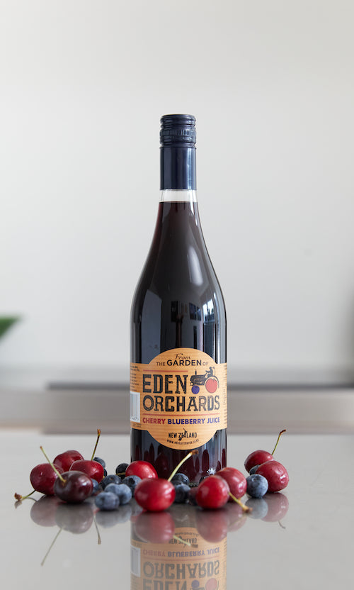 A Bottle of Eden Orchard's Cherry & Blueberry Juice - 750ml each (Stylised)